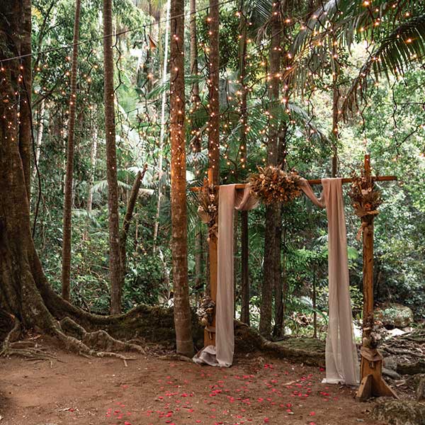 An intimate wedding or elopement ceremony at Crystal Creek Rainforest Retreat packaged with wedding planner, celebrant, photographer and a 5-night honeymoon